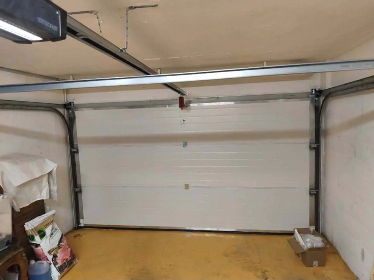 réparation porte de garage sectionnelle Couvrot 