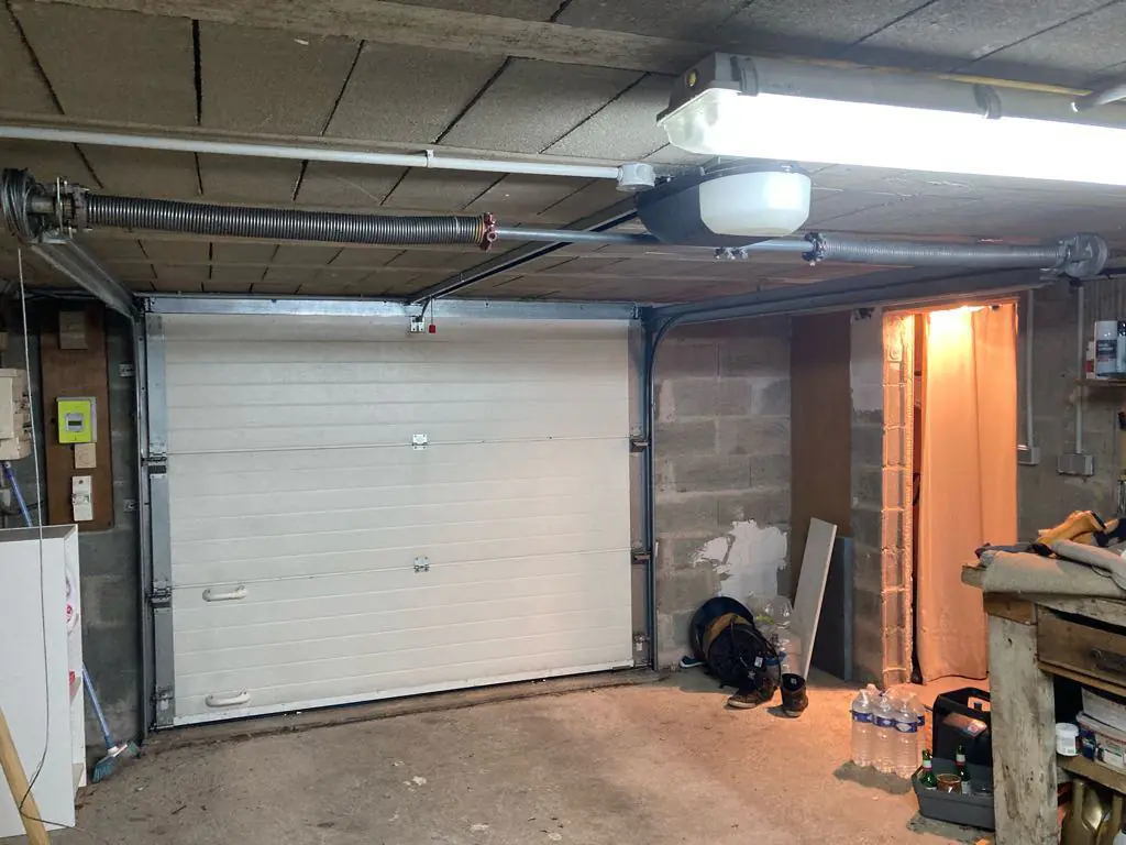 Réparation porte de garage sectionnelle Sainte-Menehould (51800)