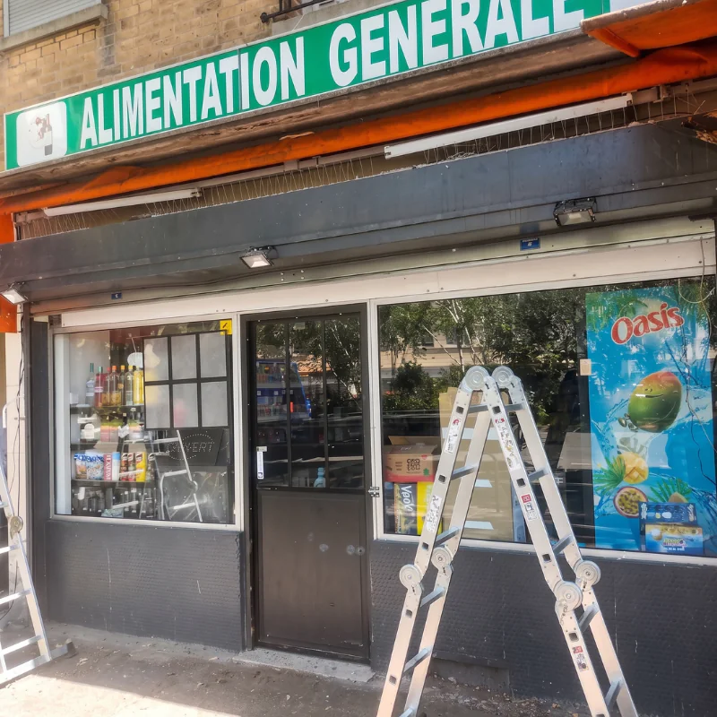 Remplacement d'un axe motorisé et d'un tablier de rideau métallique pour BD Supérette à Bourg-la-Reine