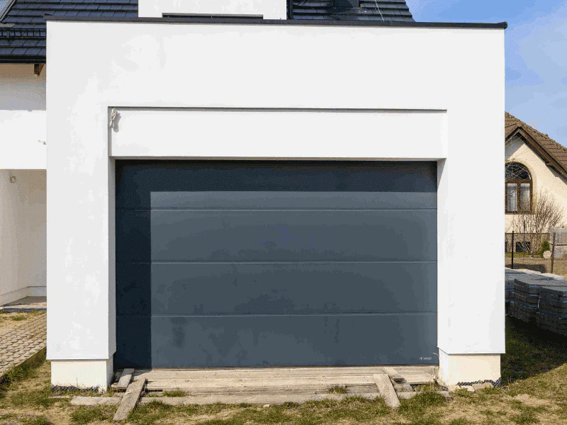 réparation porte de garage sectionnelle Omey