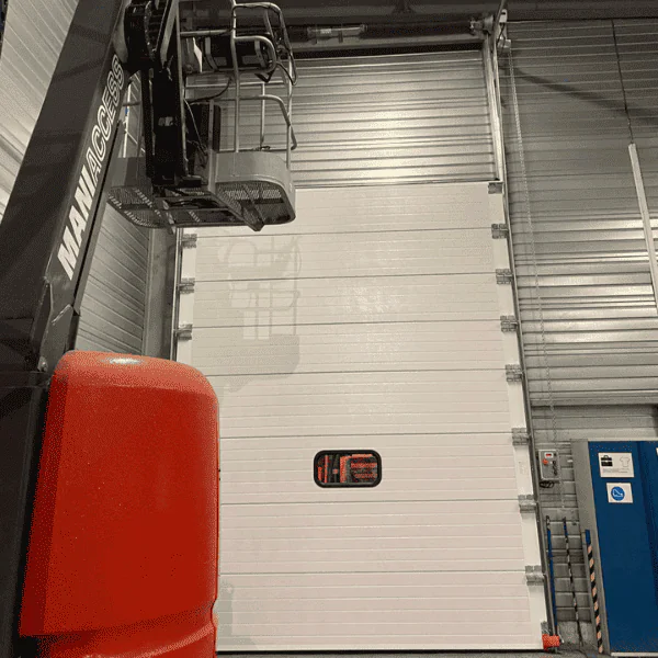 Réparation porte sectionnelle industrielle Bouilly