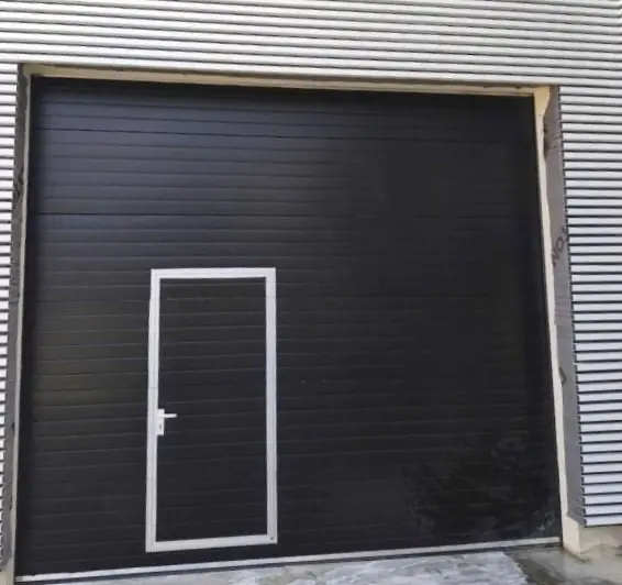 Réparation porte sectionnelle industrielle Rillieux-la-Pape