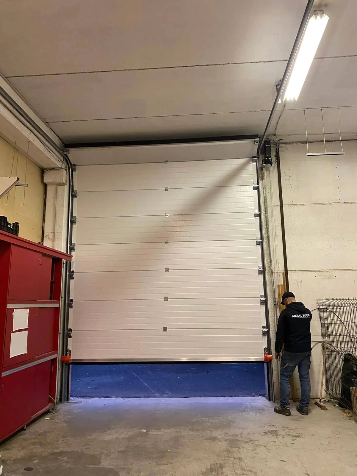 Réparation porte sectionnelle industrielle Torvilliers