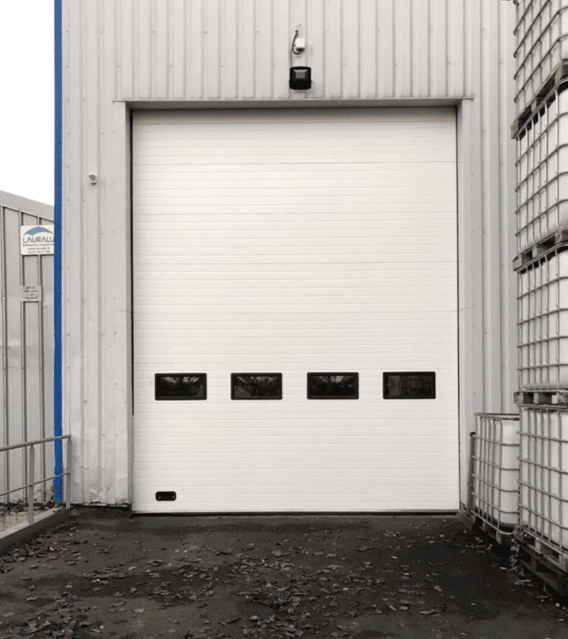 Réparation porte sectionnelle industrielle Payns