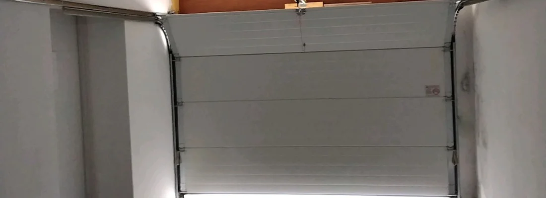 Porte de garage sectionnelle signée METAL 2000 Nßmes