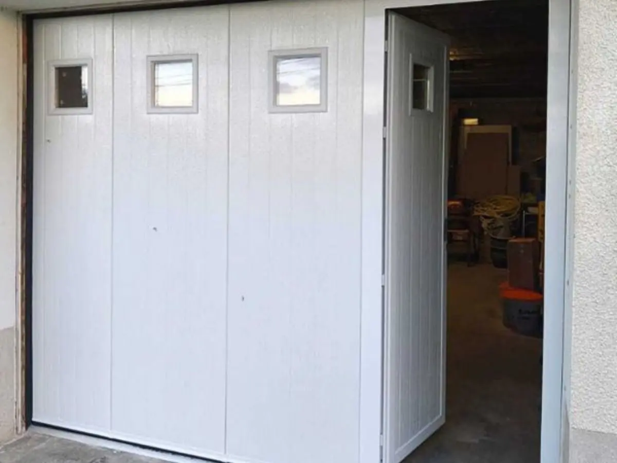 Réparation porte de garage coulissante latérale à Savières