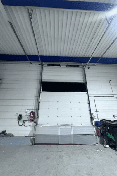 remplacement panneaux porte industrielle Aix-Villemaur-Pâlis