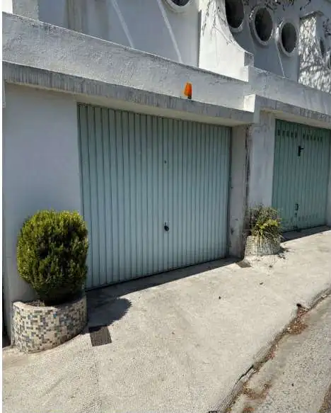 remplacement porte de garage basculante Pont-Sainte-Marie