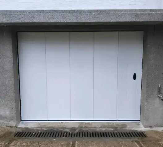 réparation porte de garage coulissante latérale à Piney