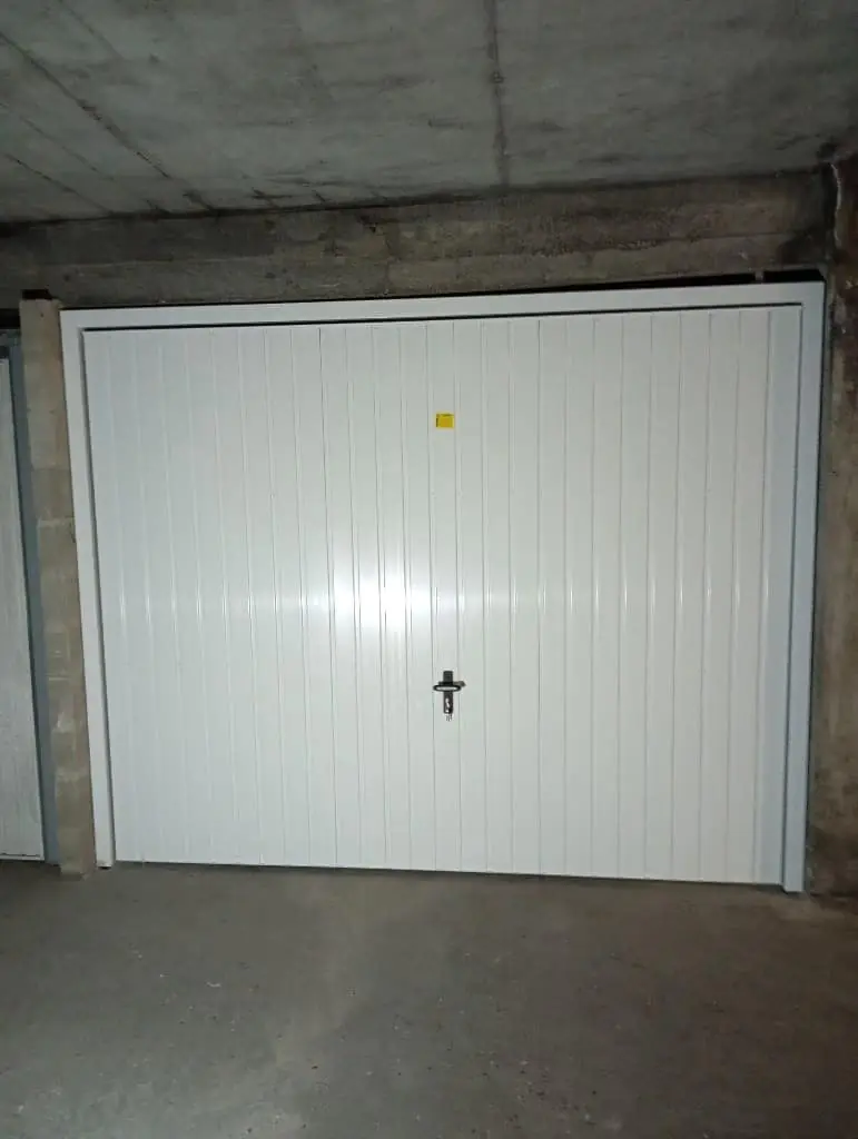 Réparation porte de garage basculante Traînel
